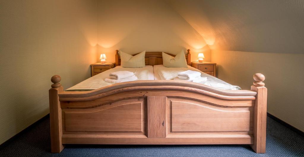 Postel nebo postele na pokoji v ubytování Appartement-Hotel-Anlage Tannenpark
