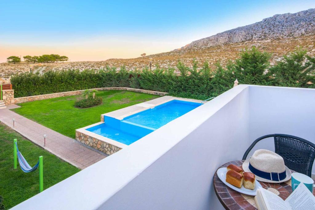 The swimming pool at or close to Lindos Emerald