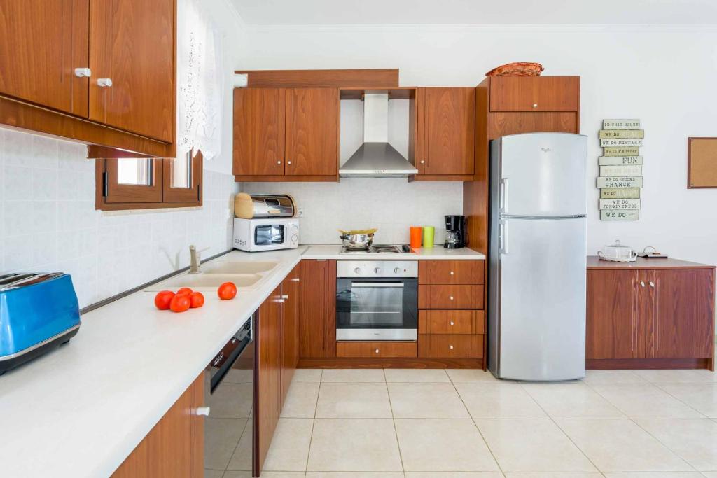 A kitchen or kitchenette at Lindos Emerald