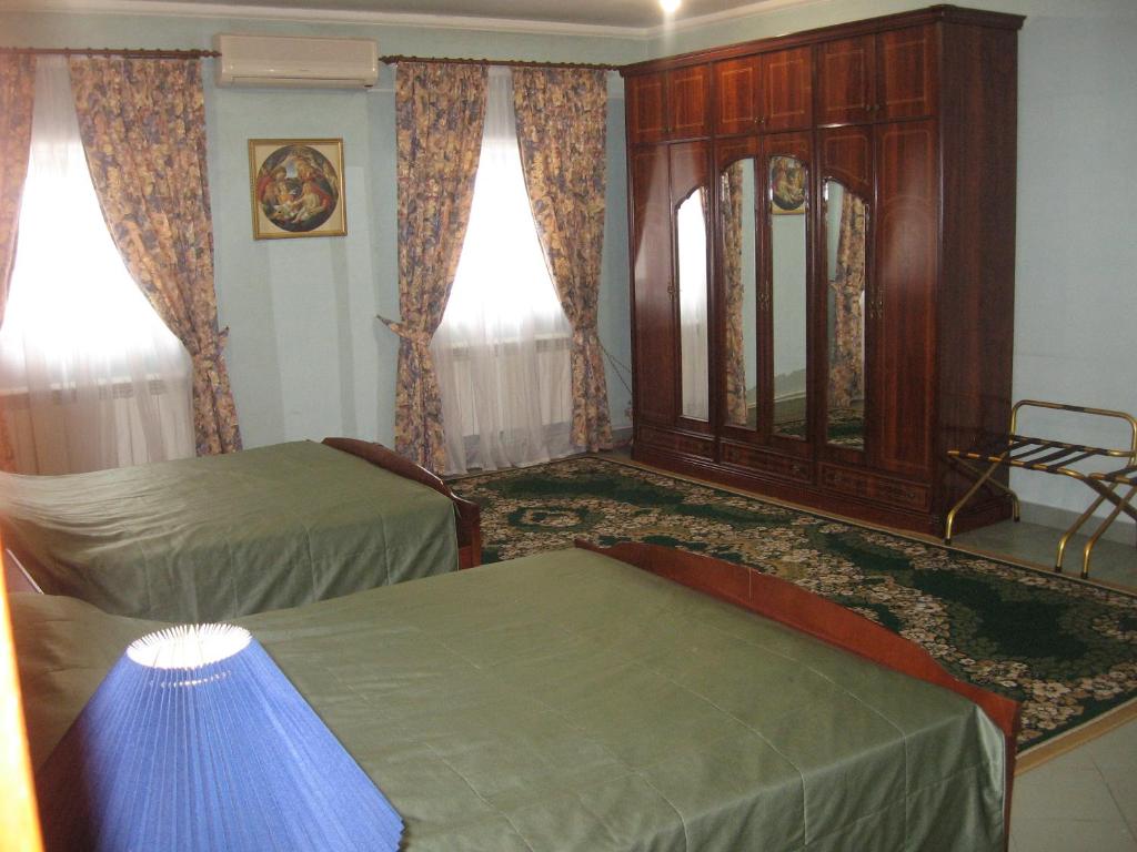 Postel nebo postele na pokoji v ubytování Giuseppe Hotel
