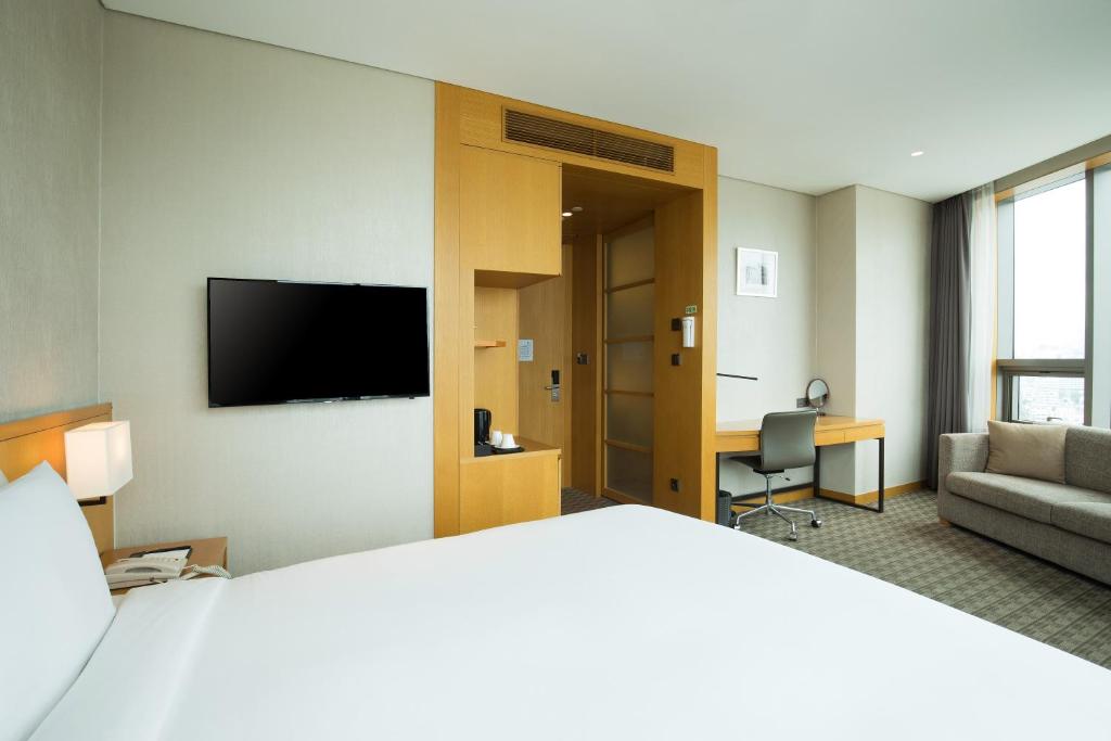 Postel nebo postele na pokoji v ubytování Sotetsu Hotels The Splaisir Seoul Dongdaemun