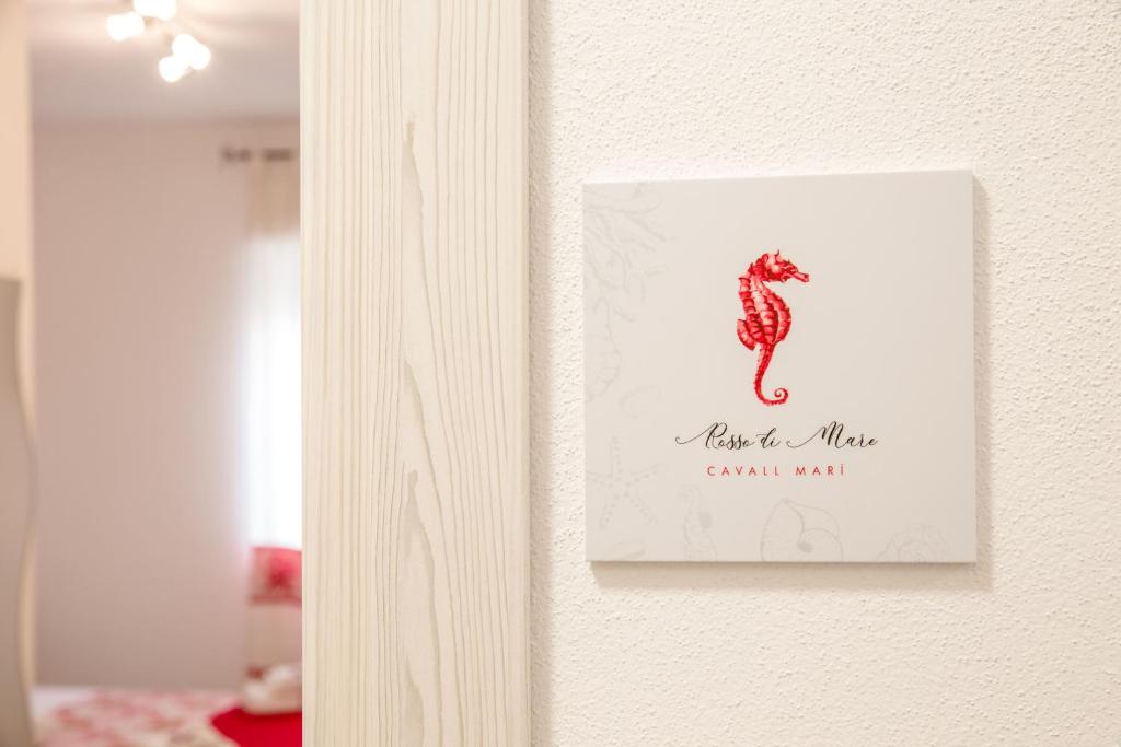 Postel nebo postele na pokoji v ubytování Rosso di Mare Alghero