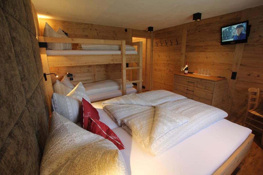 Postel nebo postele na pokoji v ubytování Hotel Maroi