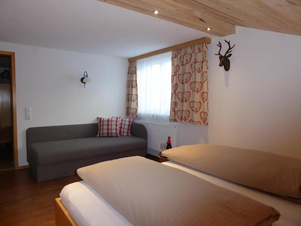 Postel nebo postele na pokoji v ubytování Hotel Maroi