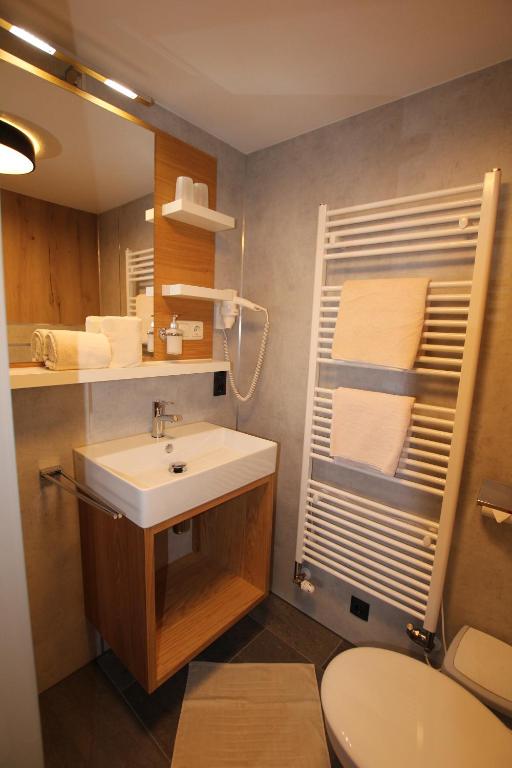 Koupelna v ubytování Hotel Maroi