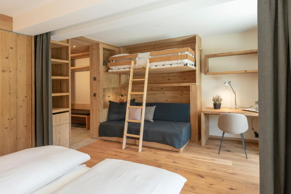 Postel nebo postele na pokoji v ubytování Hotel Albris