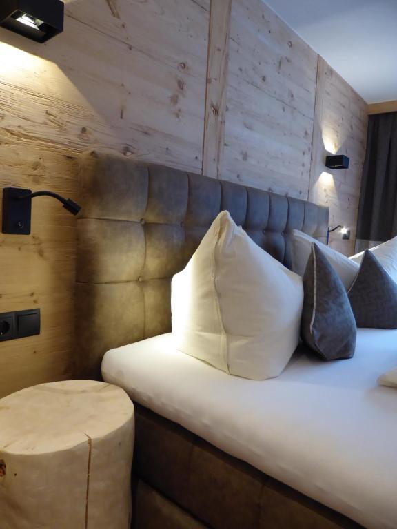 Postel nebo postele na pokoji v ubytování Hotel Maroi