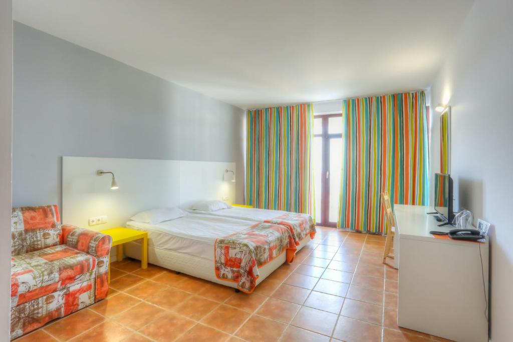 Cama o camas de una habitación en Hotel Erma