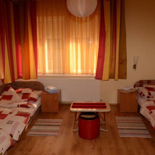 Postel nebo postele na pokoji v ubytování Hutasori Guesthouse