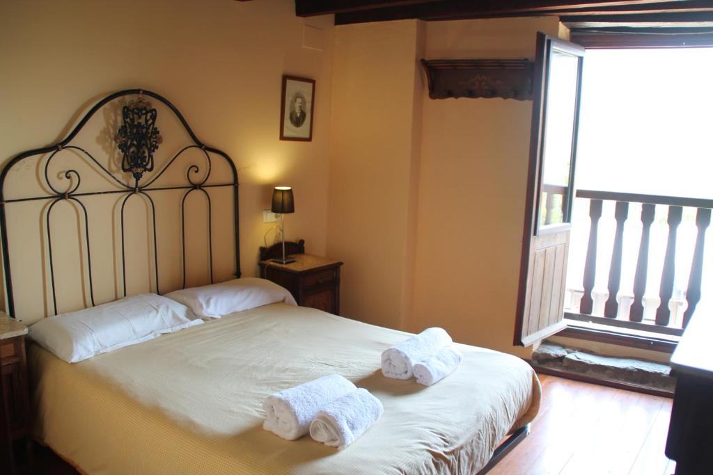 Cama o camas de una habitación en Can Bonada