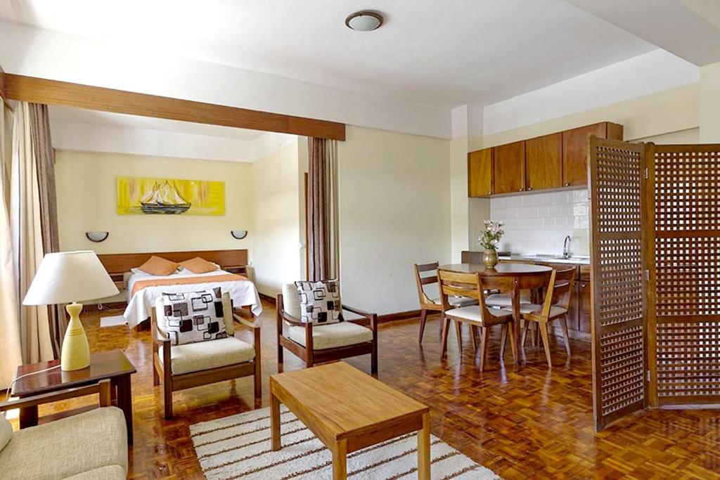 Posezení v ubytování Aparthotel Avenida