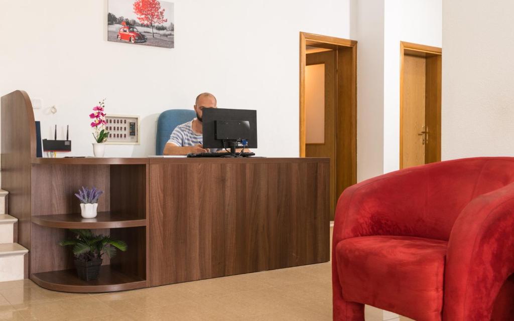 TV a/nebo společenská místnost v ubytování Villa Millenium