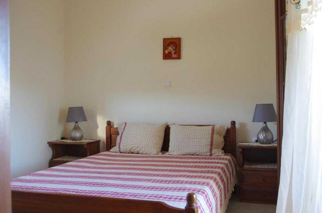 Ένα ή περισσότερα κρεβάτια σε δωμάτιο στο Limnes Home