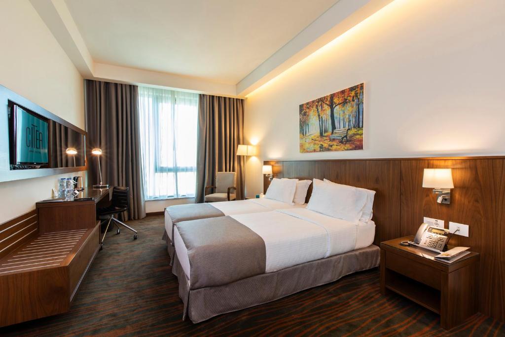 Postel nebo postele na pokoji v ubytování Citea Apart Hotel