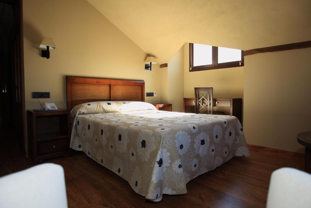 Postel nebo postele na pokoji v ubytování Hotel Zerbinetta