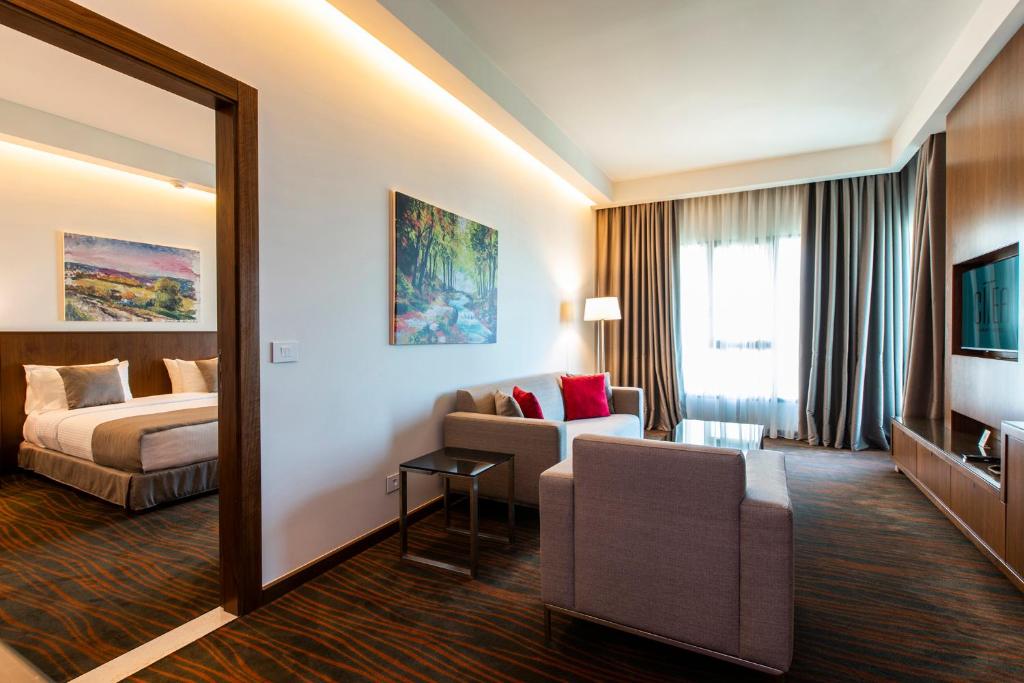 Postel nebo postele na pokoji v ubytování Citea Apart Hotel