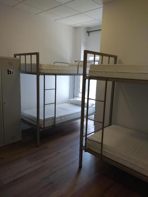Postel nebo postele na pokoji v ubytování Check In León