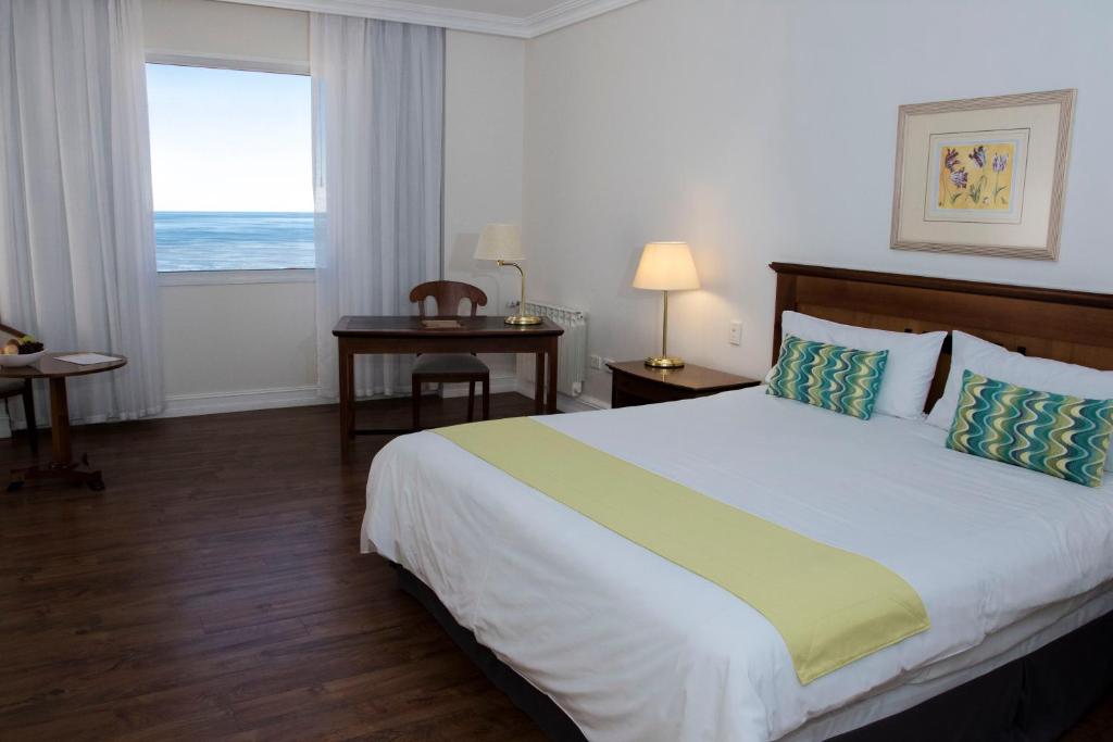 Letto o letti in una camera di Lucania Palazzo Hotel