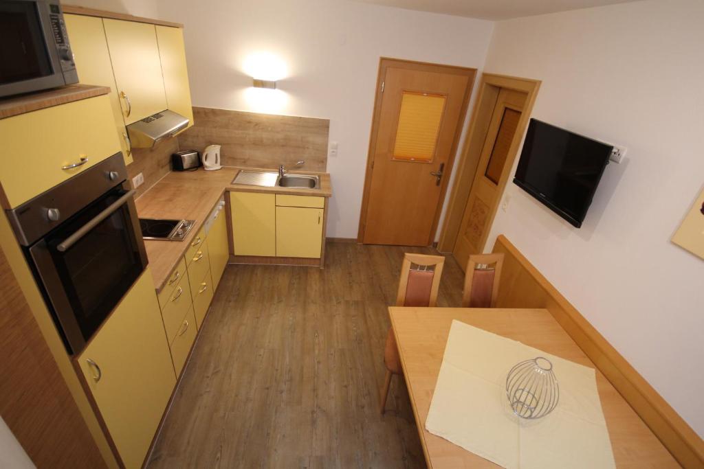 Kuchyň nebo kuchyňský kout v ubytování Haus Dorfblick