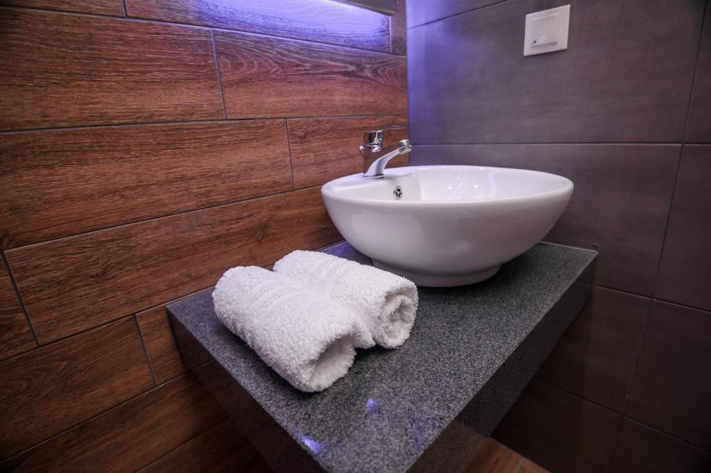 Koupelna v ubytování Hotel Yakinthos