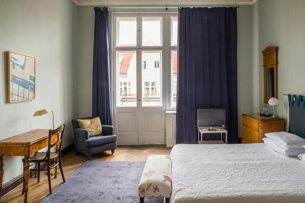 Postel nebo postele na pokoji v ubytování Hotel Art Nouveau am Kurfürstendamm