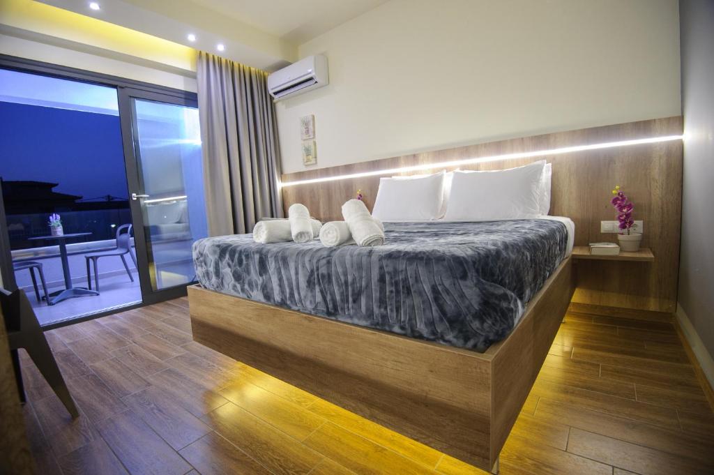 Postel nebo postele na pokoji v ubytování Hotel Yakinthos