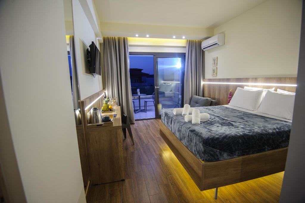 Postel nebo postele na pokoji v ubytování Hotel Yakinthos