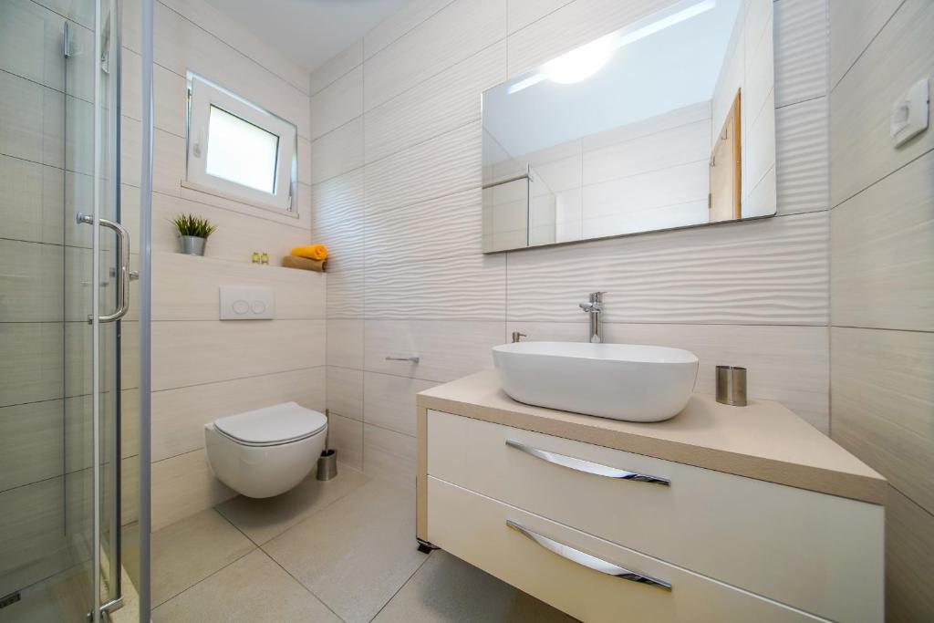 Koupelna v ubytování Apartmani Ponta