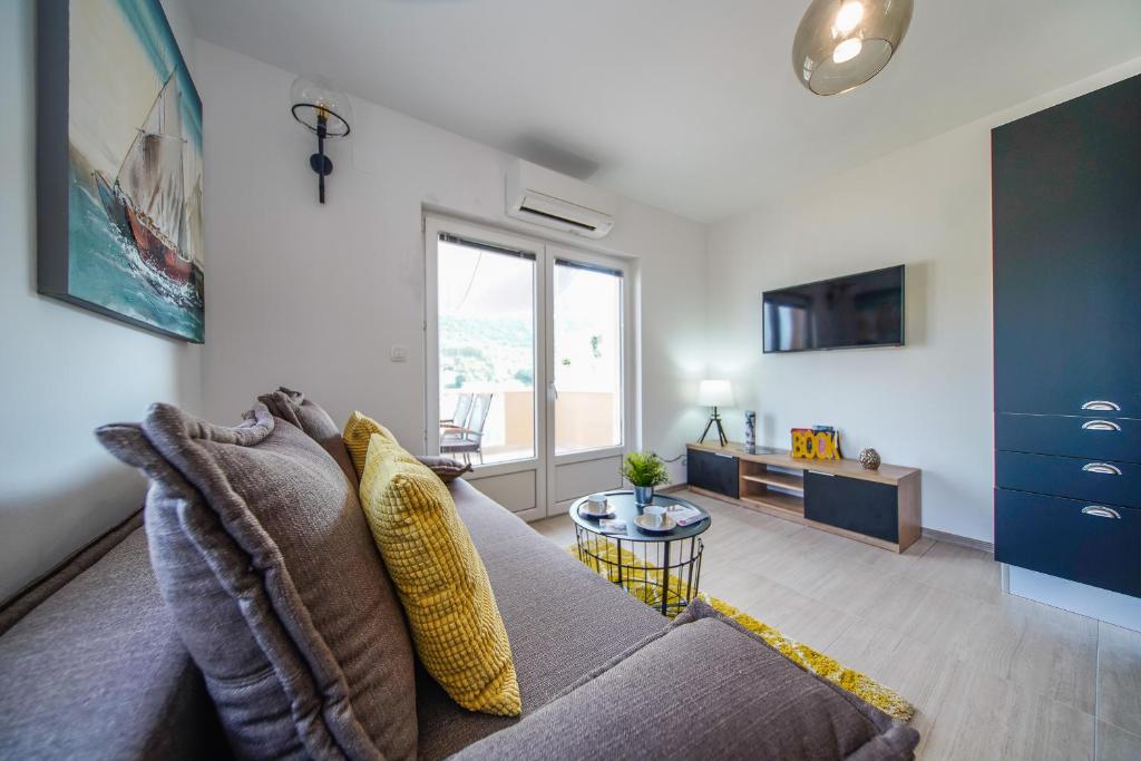 TV a/nebo společenská místnost v ubytování Apartmani Ponta