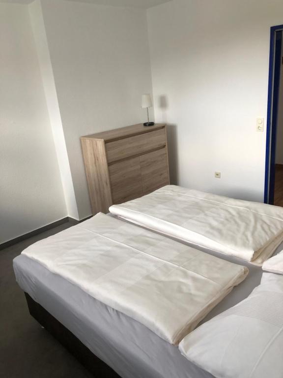 Postel nebo postele na pokoji v ubytování Hotel Falkenstein