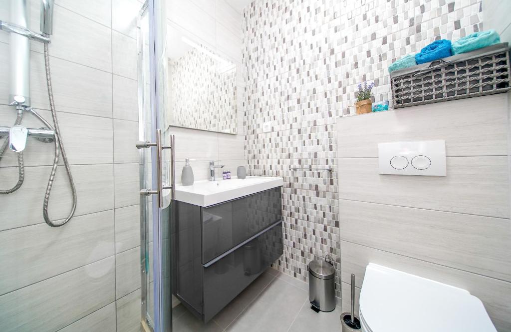 Koupelna v ubytování Apartmani Ponta