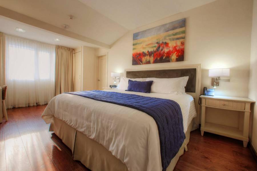 Postel nebo postele na pokoji v ubytování Isabella Boutique Hotel