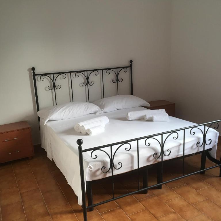Postel nebo postele na pokoji v ubytování Agriturismo Capani