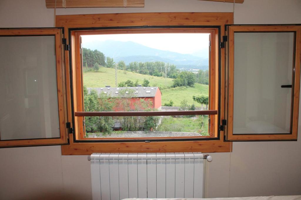 Nespecifikovaný výhled na hory nebo výhled na hory při pohledu z apartmánu