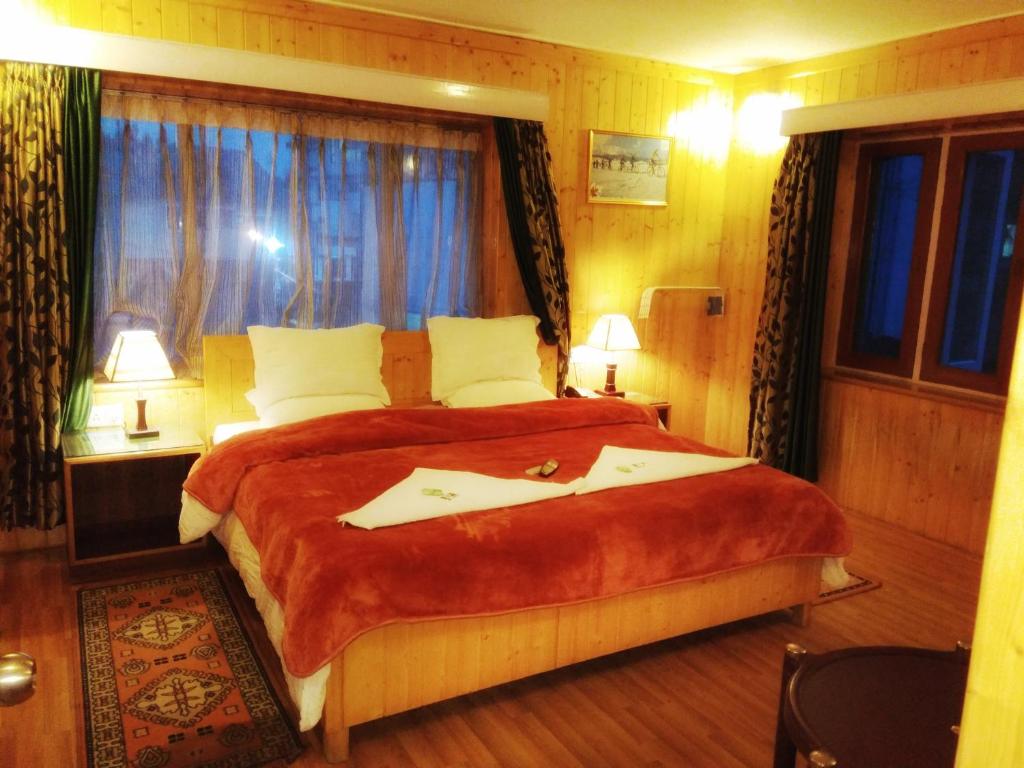 Postel nebo postele na pokoji v ubytování Ikraam Inn Bed & Breakfast