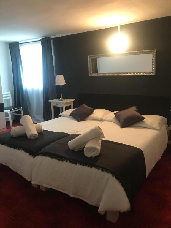 Postel nebo postele na pokoji v ubytování B&B Osteria Morganti
