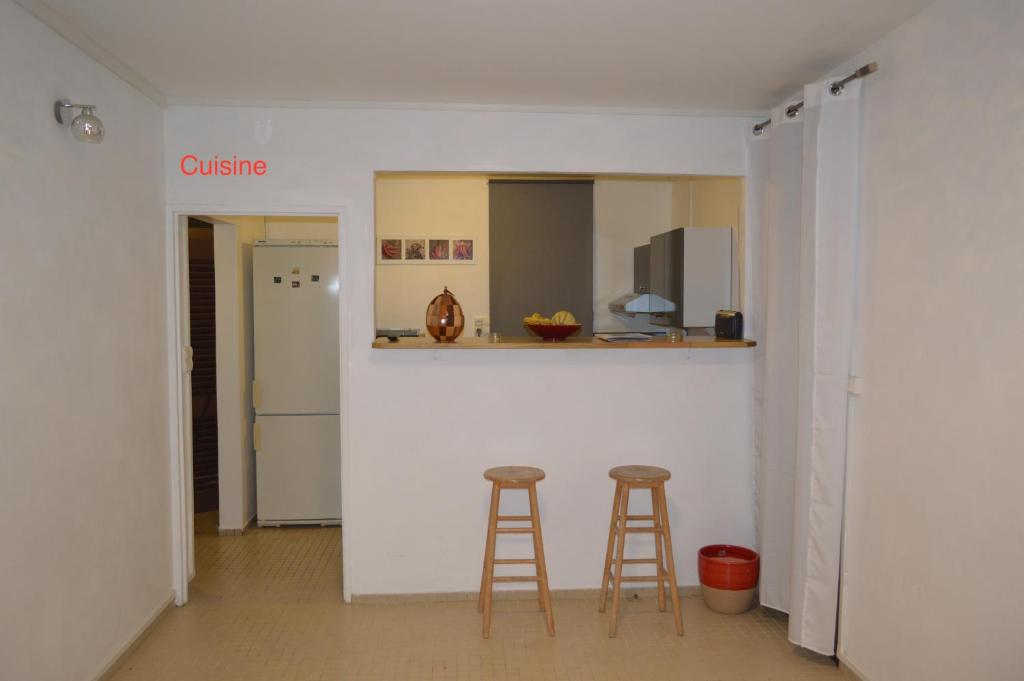 Kuchyň nebo kuchyňský kout v ubytování Maison Petit Paradis