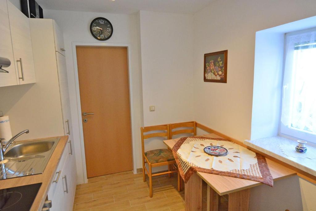 Kuchyň nebo kuchyňský kout v ubytování Appartement Gombotz