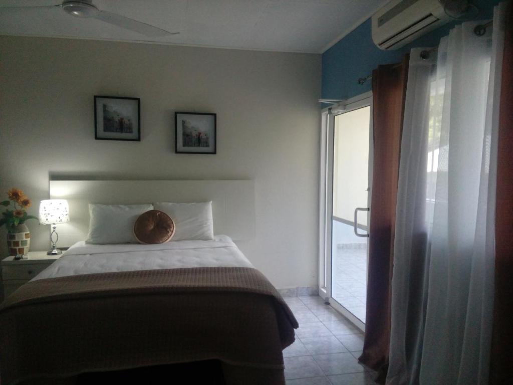 Postel nebo postele na pokoji v ubytování Hotel Vista del Mar