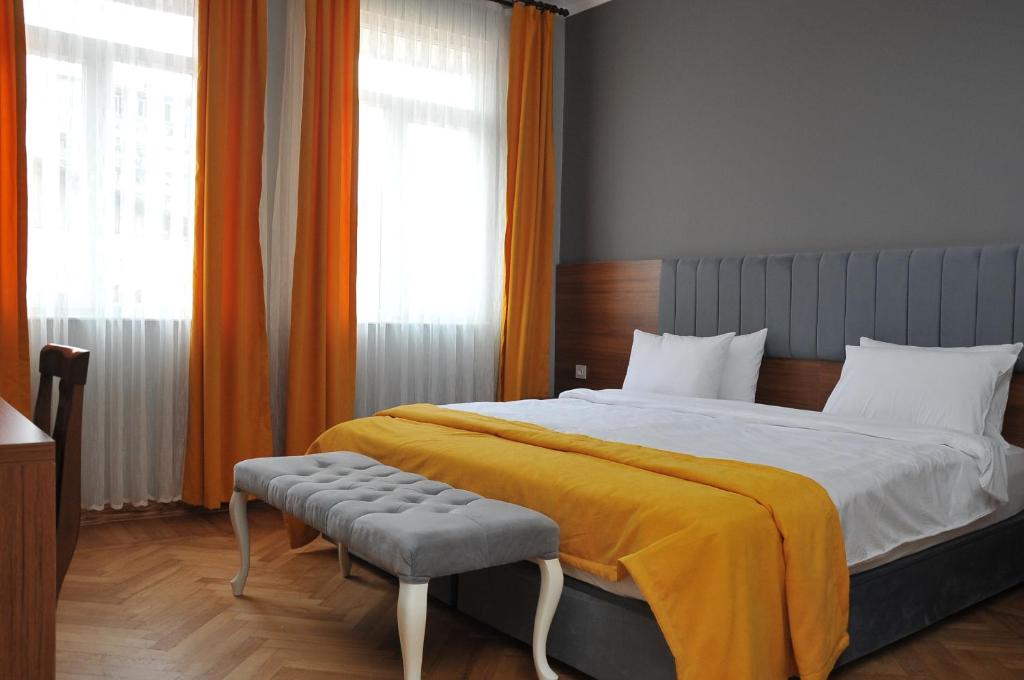 Postel nebo postele na pokoji v ubytování Palm Hotel