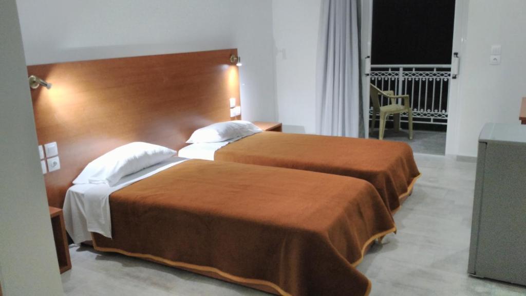 Postel nebo postele na pokoji v ubytování Hotel Sydney