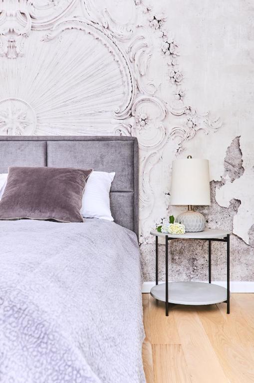 Posteľ alebo postele v izbe v ubytovaní Chodkiewicza 10 (B) - cozy studio by Homeprime