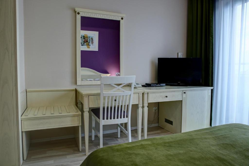 TV a/nebo společenská místnost v ubytování Hotel Gorenje