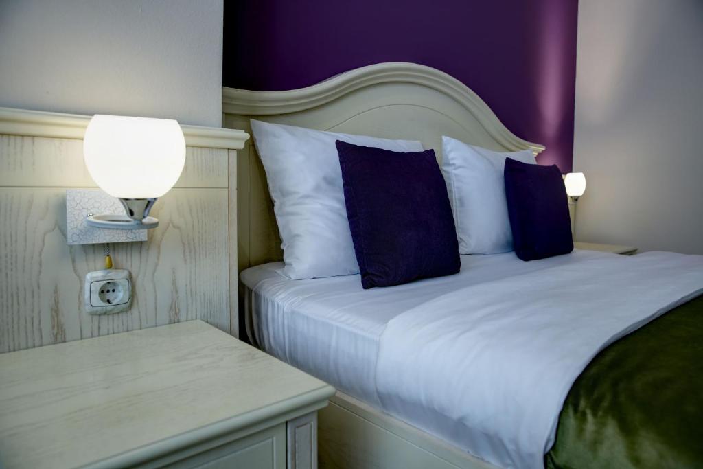 Postel nebo postele na pokoji v ubytování Hotel Gorenje