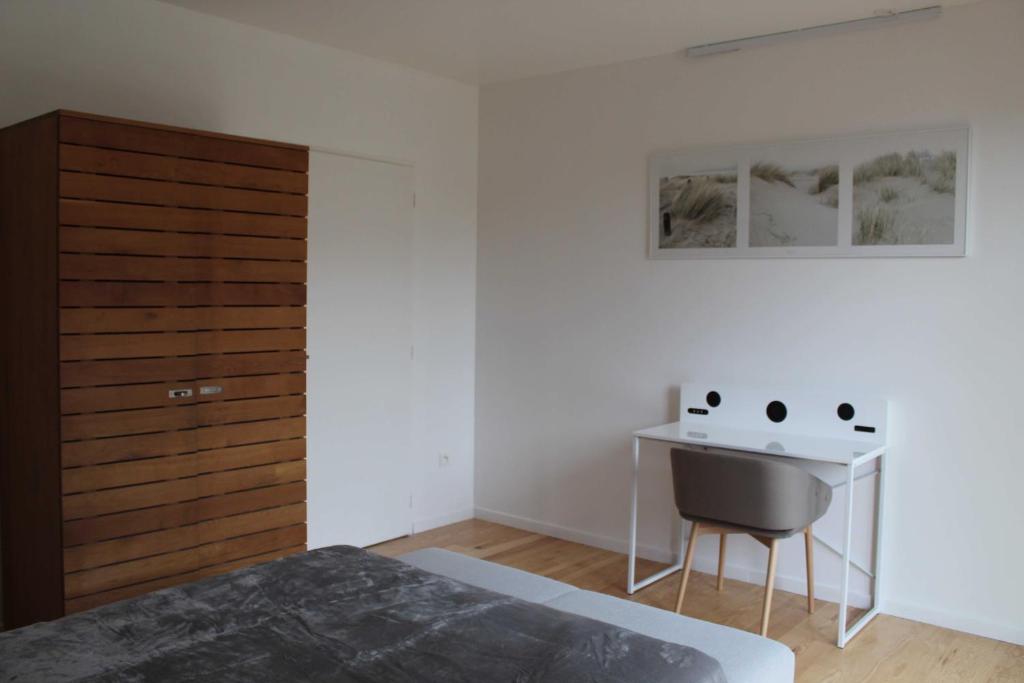 Postel nebo postele na pokoji v ubytování Chambres d'Hôtes 1001 NUITS Montalivet