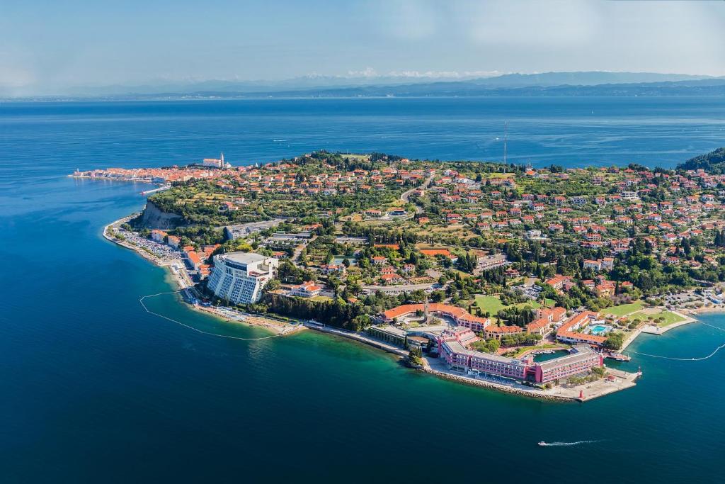 an aerial view of a small island in the water at Grand Hotel Bernardin in Portorož