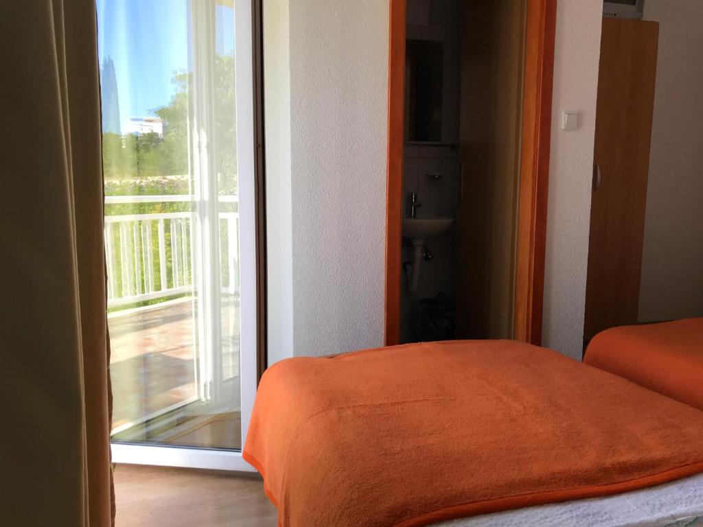 Postel nebo postele na pokoji v ubytování Room Ivana