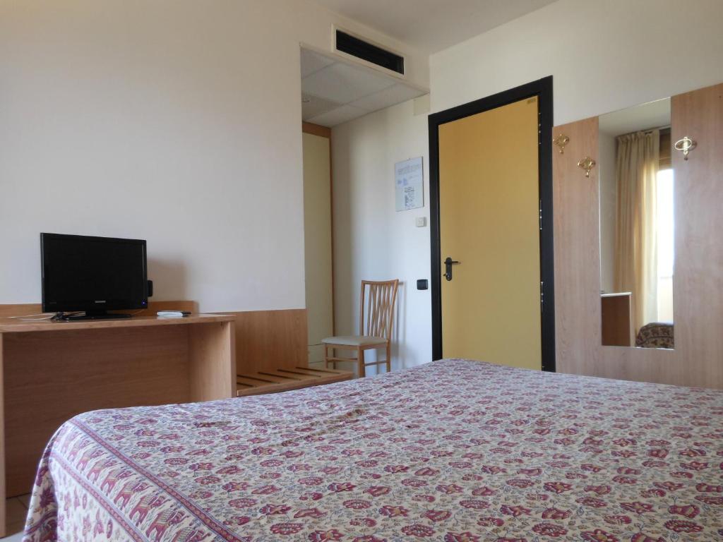 Postel nebo postele na pokoji v ubytování Motel Monterosa