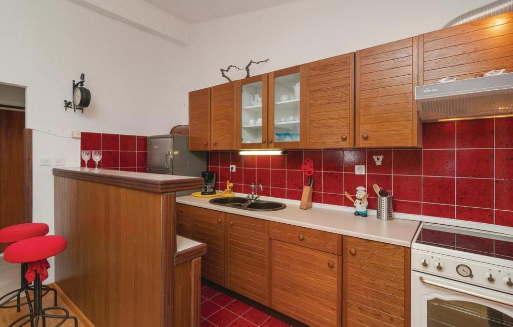 Kuchyň nebo kuchyňský kout v ubytování House Nada