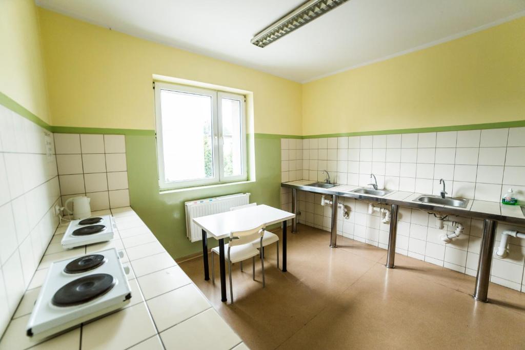 Kuchyňa alebo kuchynka v ubytovaní Ondraszka